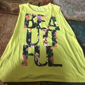 Bright yellow tank top that says beautiful